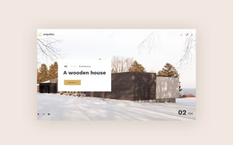 A modern wooden house with dark exterior walls sits in a snowy landscape surrounded by leafless trees and evergreens, featured on a minimalist architecture website titled A wooden house.