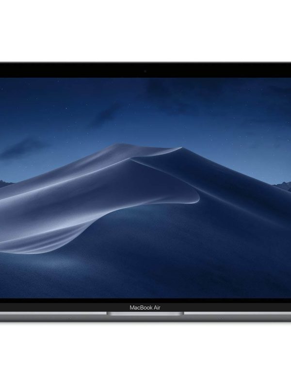A MacBook Air laptop with a dark screen displaying a night desert landscape with sand dunes and a starry sky.
