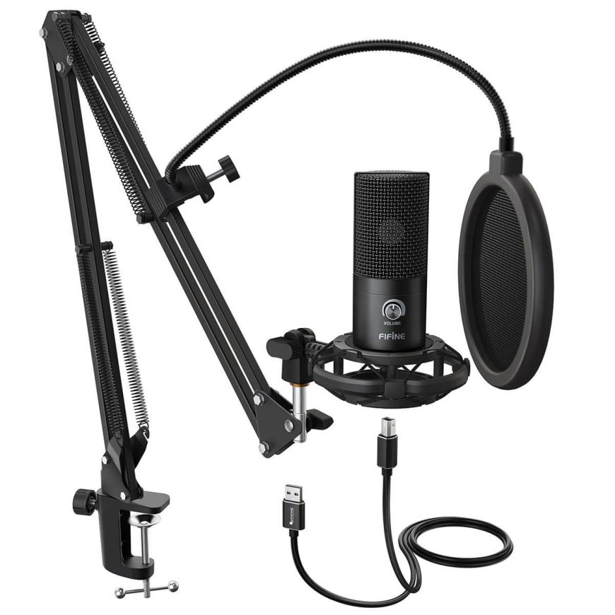 A black desktop microphone set with an adjustable arm, shock mount, USB cable, and a round pop filter attached, designed for professional audio recording or podcasting.