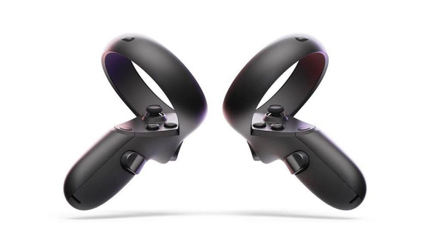 Two black virtual reality controllers with circular loops facing inward, positioned upright on a white background.
