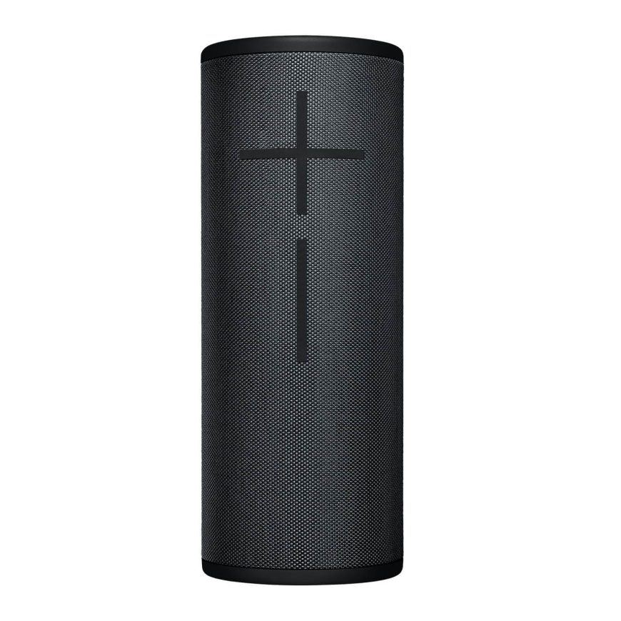A black cylindrical portable Bluetooth speaker with a mesh surface, featuring large plus and minus buttons for volume control on the front.