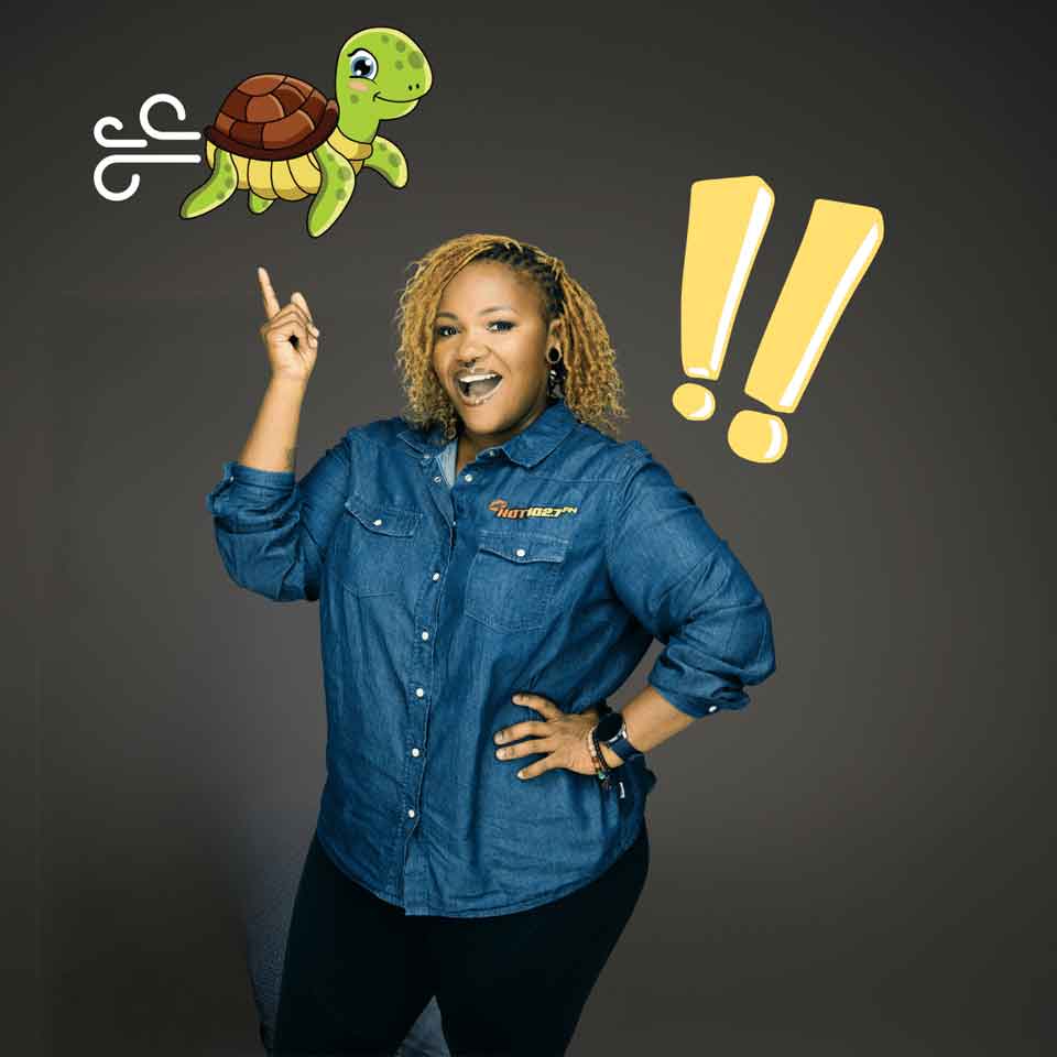 A smiling woman in a denim shirt points upward, with a cartoon turtle and yellow exclamation marks illustrated beside her on a dark background.