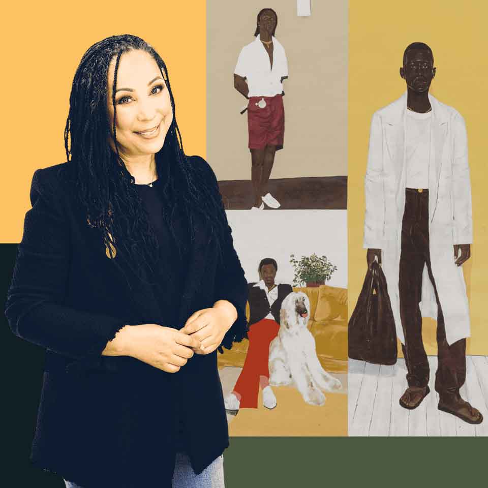 A smiling woman with long braids and a black blazer stands in front of a collage of three painted portraits of Black men, one of whom is seated with a large white dog.