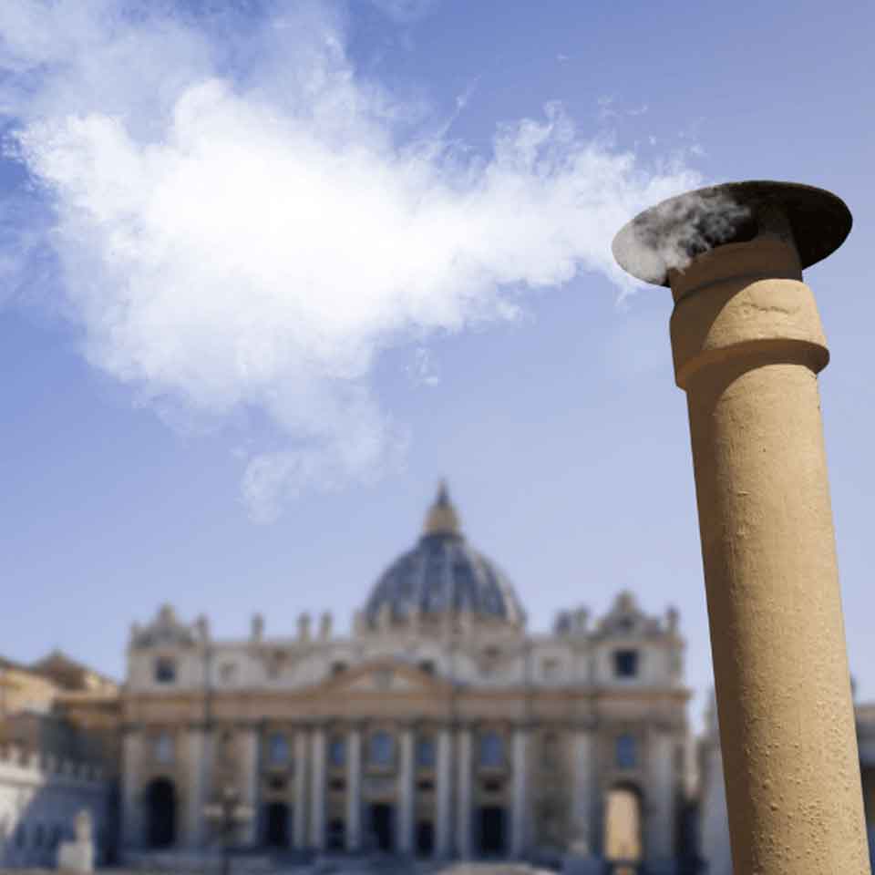 A plume of white smoke rises from a chimney in front of St. Peter’s Basilica at the Vatican, signaling the election of a new pope.