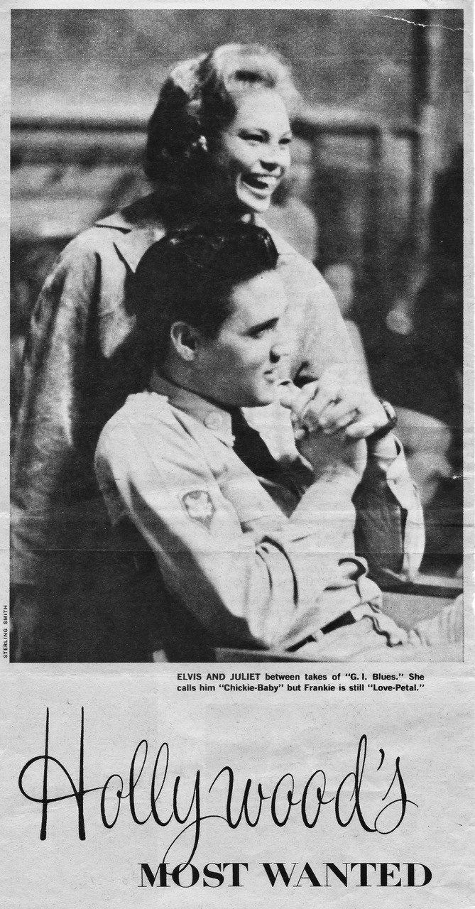 Black-and-white photo of a smiling woman standing behind a seated man in a military uniform. Both appear relaxed. Text below reads: Hollywood’s MOST WANTED with a caption about Elvis and Juliet.